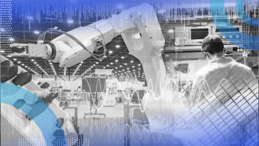 A robotic arm with an engineer working on it