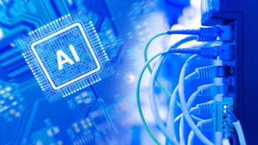  A conceptual illustration featuring a microchip labeled with AI on a circuit board layered over fiber optic cables plugged into a network server.