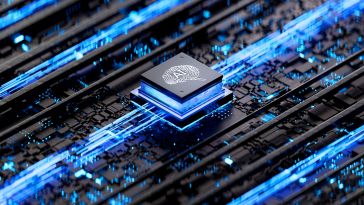 A photo of a hardware chip with a brain icon to show the idea of AI development 