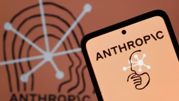 A smartphone showing the Anthropic logo.