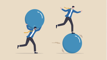An illustration of one businessman carrying a heavy large sphere on his shoulders while another businessman races in front of him by balancing on top of a moving heavy large sphere.