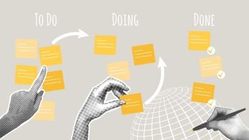 A person tracks the progress of a project using sticky notes, similar to a project management tool.