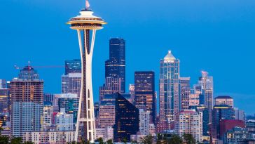 A view of the Seattle skyline featuring the Space Needle and several high-rise buildings.