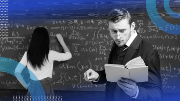 A man reads from a book while a woman does math on a chalkboard