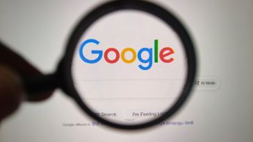 Google site with a magnifying glass over it