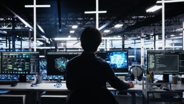 AI engineer working at a computer