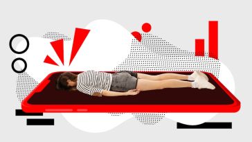 A person lies facedown on a mat. 