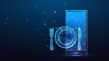 An image of a holographic plate, fork, knife, and tablet to show the idea of restaurant tech. 