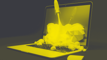 A digital rocket launches from a laptop