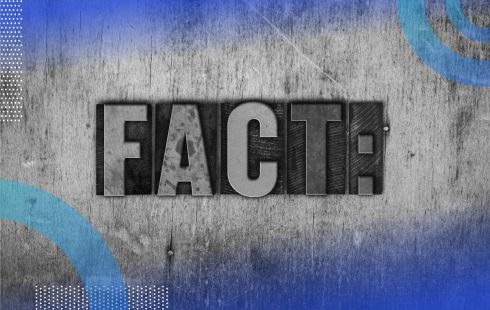 Block letterpress letters spelling FACT: are arranged against a wooden background. /marketing/public-relations-myths-rebuttal