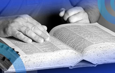 Person reading dictionary