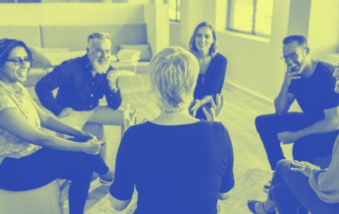 employees sitting in a resource group