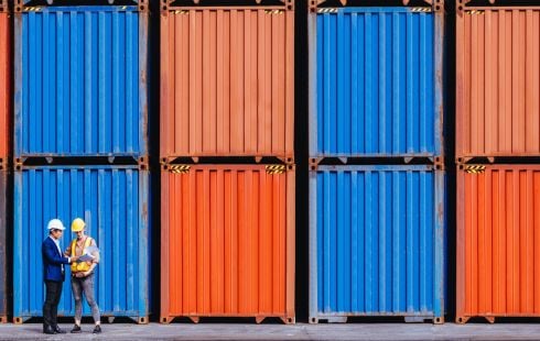 a photo of shipping containers from a supply chain company