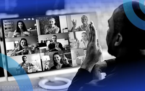 A person using sign language on a Zoom call with other people also using sign language.