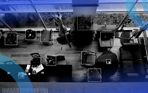 overhead view of a room with bounding boxes for computer vision