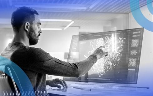 data scientist analyzing a cluster of data points on computer