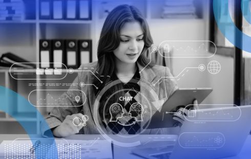 A woman uses a laptop and tablet with multiple AI tools