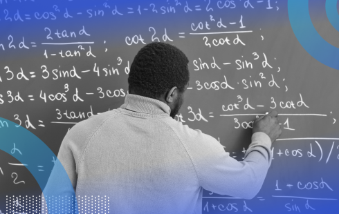 A professor does math on a chalkboard