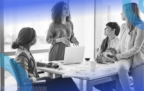 Team of employees discussing strategy in office