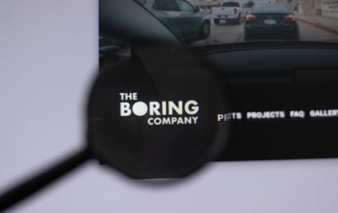 A photo of the Boring Company logo on a computer screen.