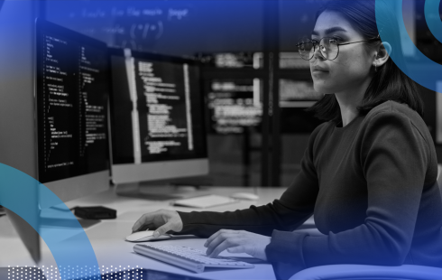 Cybersecurity professional working on a computer