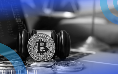Bitcoin, gavel and a computer showing crypto trends