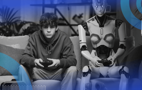 A man sits on a couch playing video games with a robot