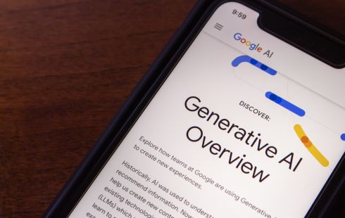 Photo of Google's AI Overview site pulled up on a smartphone