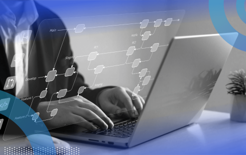 A worker uses a laptop with a database overlay