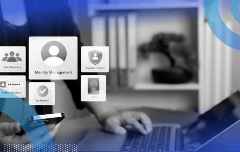 A user works on a laptop with a smartphone and identity access icons