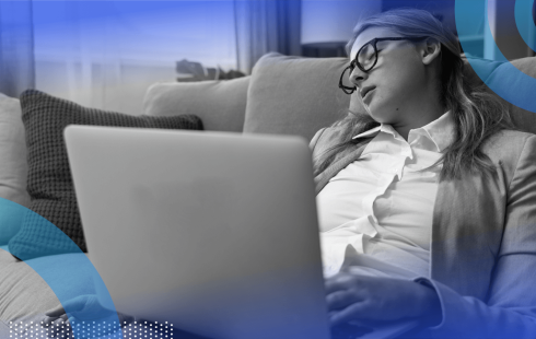 A woman sleeps with a laptop on her lap