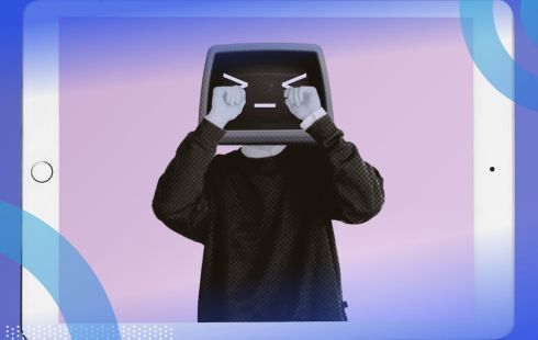Person's body with a computer for a face. The computer screen has a crying face and the person's hands are rubbing its eyes like a baby.