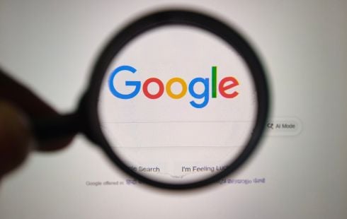 Google site with a magnifying glass over it