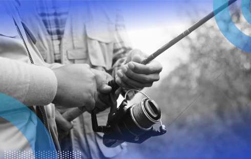A man holds a fishing rod