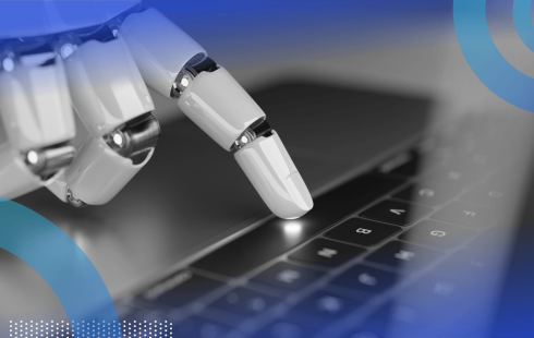 A robotic hand presses a keyboard