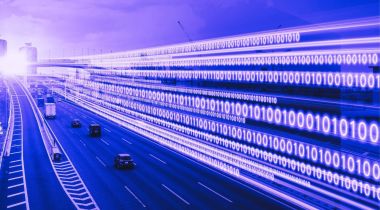 binary code next to highway to represent ai in cars