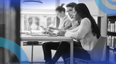 Unsupervised learning image of a man and a woman working at a laptop and looking at the screen together