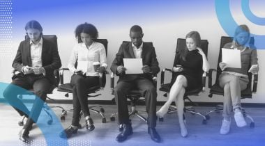 Diverse candidates waiting to be interviewed. Skills-based hiring leads to better and more diverse hires.