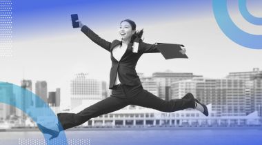 A woman jumping in the air. Bounce back from being fired by taking care of yourself and not rushing into another job.