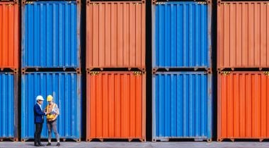 a photo of shipping containers from a supply chain company