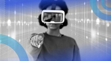 A woman wearing a VR headset pointing toward the camera as though interacting with a screen.