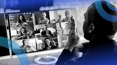 A person using sign language on a Zoom call with other people also using sign language.