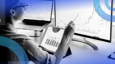 data analyst reviewing data points on computer