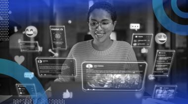 A smiling woman engaging with holographic representation of IoT.