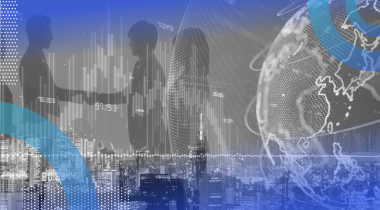 A digital globe with silhouettes of people shaking hands alongside above a city skyline