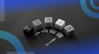 Five dice, numbered one through five, presented in a fan-like semi-circle, representing a dial.