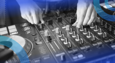 A close-up of someone tuning a DJ board.