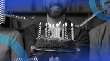 people blowing out birthday candles on a cake