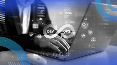 A developer works on a laptop with a DevOps logo