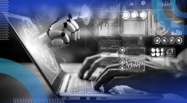 Closeup of hands typing on a laptop with a robot hand emerging from the screen
